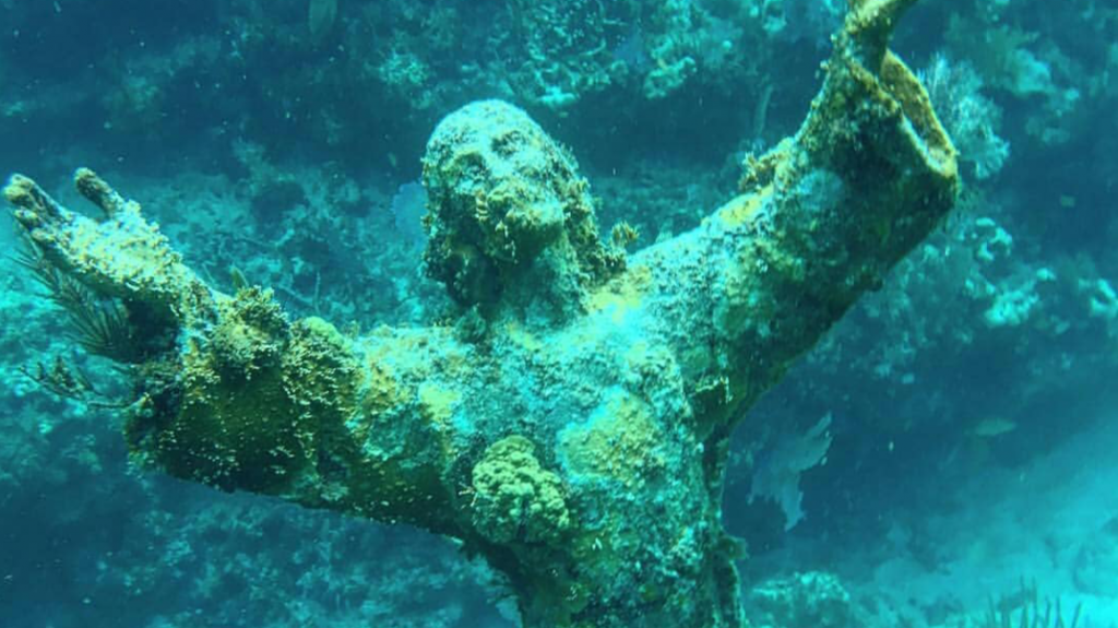 scary statues underwater
